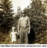 Capt William Hammond, 36-HqC, and boy from Conc. camp
