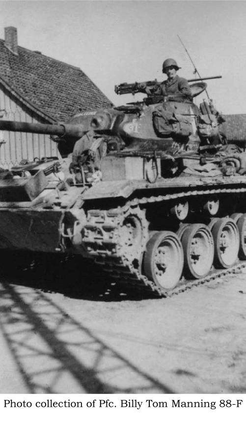 Unidentified soldiers on tank. Pfc. Billy Tom Manning, 88-F