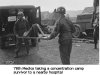 Langenstein survivor being taken to a hospital.