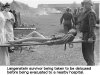 Langenstein survivor being taken to be deloused