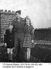 T/5 Bealko, 18-A, with two children